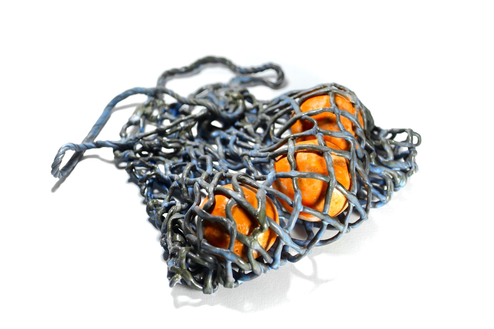 Sac filet gris avec oranges